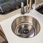 Deep Stainless Steel Sink May Show Optional Features. Features and Options Subject to Change Without Notice.