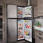 Optional 18 cu. ft. stainless steel
gas/electric refrigerator May Show Optional Features. Features and Options Subject to Change Without Notice.