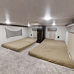 The versatile 40CL loft model expands living space vertically.  this 2nd bedroom, complete with large, 42" x 72" bunk mats an plenty of storage can be used as a kid friendly play area or an attic May Show Optional Features. Features and Options Subject to Change Without Notice.