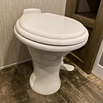 Porcelain Stool w/ Water Jet Assist May Show Optional Features. Features and Options Subject to Change Without Notice.