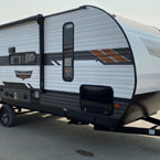 A front entry side exterior view of the 22RBS with the power awning extended. May Show Optional Features. Features and Options Subject to Change Without Notice.