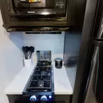 Kitchen Stove with Microwave Above May Show Optional Features. Features and Options Subject to Change Without Notice.