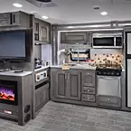 Kitchen and Entertainment Center in the 34H5 with Stone Interior May Show Optional Features. Features and Options Subject to Change Without Notice.