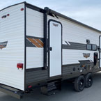 Wildwood 26DBUD Rear Door Side 3/4 View May Show Optional Features. Features and Options Subject to Change Without Notice.