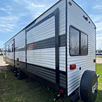 Wildwood 36VBDS Rear Off-Door Side 3/4 View May Show Optional Features. Features and Options Subject to Change Without Notice.