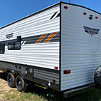 Wildwood X-Lite 241QBXL Rear 3/4 Off-Door Side View May Show Optional Features. Features and Options Subject to Change Without Notice.