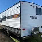 Wildwood X-Lite 261BHXL Rear 3/4 Off-Door Side View May Show Optional Features. Features and Options Subject to Change Without Notice.