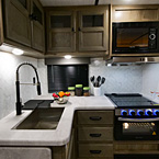 Sink, Stove and Counter May Show Optional Features. Features and Options Subject to Change Without Notice.