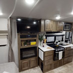 Kitchen and entertainment center May Show Optional Features. Features and Options Subject to Change Without Notice.