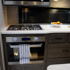  	Kitchen oven, range, and countertop May Show Optional Features. Features and Options Subject to Change Without Notice.