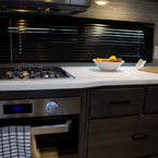 Kitchen oven, range, and countertop May Show Optional Features. Features and Options Subject to Change Without Notice.