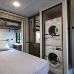 Bedroom with washer and dryer May Show Optional Features. Features and Options Subject to Change Without Notice.