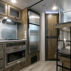 Kitchen and bunks May Show Optional Features. Features and Options Subject to Change Without Notice.