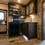 Kitchen and view into garage May Show Optional Features. Features and Options Subject to Change Without Notice.