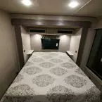 60 Inch by 74 Inch Queen Bed with Two Cabinets Overhead. Night Stands and USB Ports on Either Side of Bed.
 May Show Optional Features. Features and Options Subject to Change Without Notice.