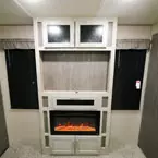 Five Door Entertainment Center in Bedroom with Fireplace.
 May Show Optional Features. Features and Options Subject to Change Without Notice.
