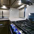     Stove, Counter space, and sink May Show Optional Features. Features and Options Subject to Change Without Notice.