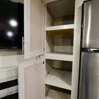 Two Door Pantry Shown Open with Four Shelves.
 May Show Optional Features. Features and Options Subject to Change Without Notice.