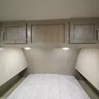 Cabinets Overhead of Bed.
 May Show Optional Features. Features and Options Subject to Change Without Notice.