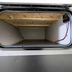 Outside Storage Compartment Shown Open, Located on the Off-Door Side. Solar Panel Controller Shown Mounted to Inside of Compartment.
 May Show Optional Features. Features and Options Subject to Change Without Notice.