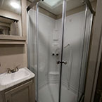 34 Inch by 34 Inch Shower with White Surround and Glass Shower Doors.
 May Show Optional Features. Features and Options Subject to Change Without Notice.