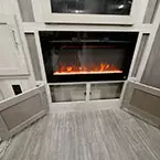 Two Doors Below Fireplace Shown Open.
 May Show Optional Features. Features and Options Subject to Change Without Notice.