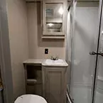 Mirrored Medicine Cabinet Overhead of Single Bowl Vanity with One Shelf and One Cabinet Door Below Sink.
 May Show Optional Features. Features and Options Subject to Change Without Notice.