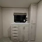 Wardrobe with Five Drawers and Four Cabinet Doors.
 May Show Optional Features. Features and Options Subject to Change Without Notice.