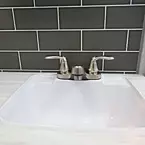 Bathroom Sink May Show Optional Features. Features and Options Subject to Change Without Notice.