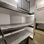 Bunk Room with Triple 28 x 72 Bunks May Show Optional Features. Features and Options Subject to Change Without Notice.