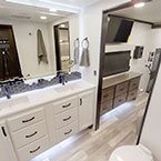 Bathroom vanity and toilet May Show Optional Features. Features and Options Subject to Change Without Notice.