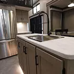 Fridge and kitchen island May Show Optional Features. Features and Options Subject to Change Without Notice.