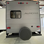 Rear view of unit with spare tire and slide-out extended
 May Show Optional Features. Features and Options Subject to Change Without Notice.