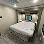 Queen size bed with overhead storage
 May Show Optional Features. Features and Options Subject to Change Without Notice.