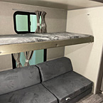 Flip-up bunk bed with cube futon underneath
 May Show Optional Features. Features and Options Subject to Change Without Notice.
