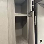 Wardrobe storage closet shown open May Show Optional Features. Features and Options Subject to Change Without Notice.