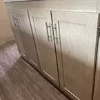 Bottom cabinet storage in kitchen island May Show Optional Features. Features and Options Subject to Change Without Notice.