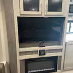 TV entertainment center with overhead storage and electric fireplace May Show Optional Features. Features and Options Subject to Change Without Notice.