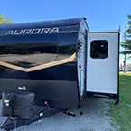Front of Aurora 26FKDS with slide out extended on off-door side May Show Optional Features. Features and Options Subject to Change Without Notice.