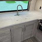 Sink with counter covers on and prep space  May Show Optional Features. Features and Options Subject to Change Without Notice.