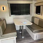 Dinette with under-bench storage with easy access storage doors and pedestal thermofoil table May Show Optional Features. Features and Options Subject to Change Without Notice.
