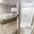 Bunk area and view of the bathroom May Show Optional Features. Features and Options Subject to Change Without Notice.