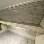 Overhead shelf above queen size bed May Show Optional Features. Features and Options Subject to Change Without Notice.