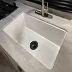 Deep undermounted farm style sink basin  May Show Optional Features. Features and Options Subject to Change Without Notice.