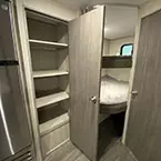 Pantry storage closet with door shown open next to bunk room May Show Optional Features. Features and Options Subject to Change Without Notice.