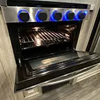 3 burner range with oven door shown open May Show Optional Features. Features and Options Subject to Change Without Notice.
