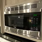 Overhead stainless steel microwave oven with range hood May Show Optional Features. Features and Options Subject to Change Without Notice.