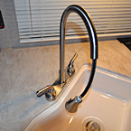 Pull Out Kitchen Faucet May Show Optional Features. Features and Options Subject to Change Without Notice.